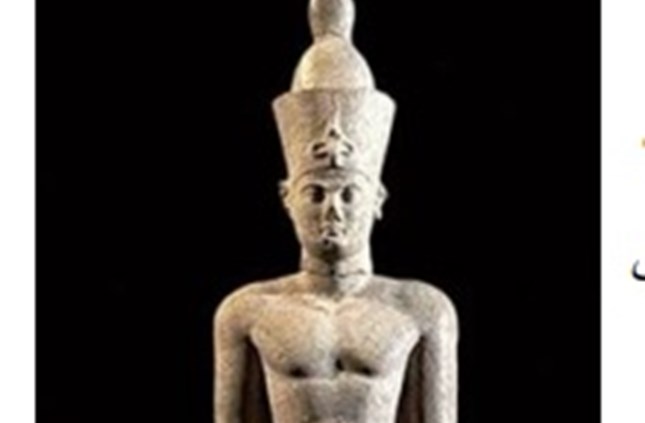 A huge red granite statue of one of the great Ptolemies: