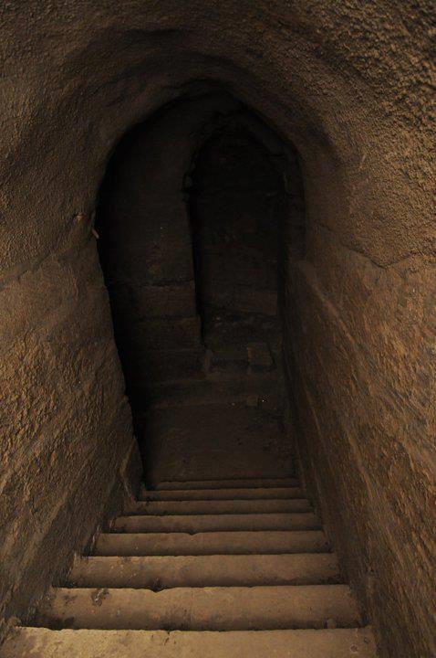 The internal staircase leading to the well