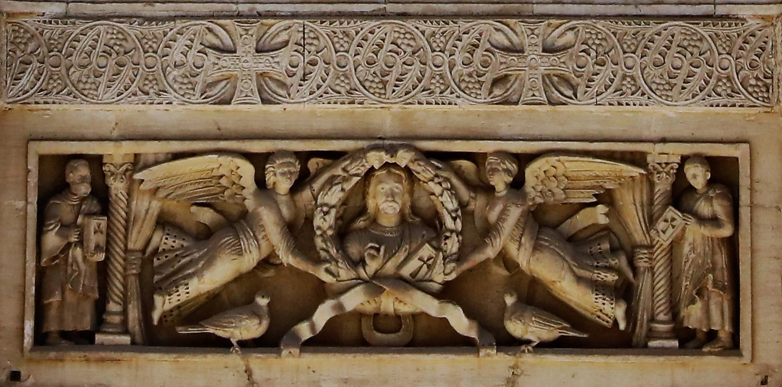 Sculptural view of Jesus carved in stone above t