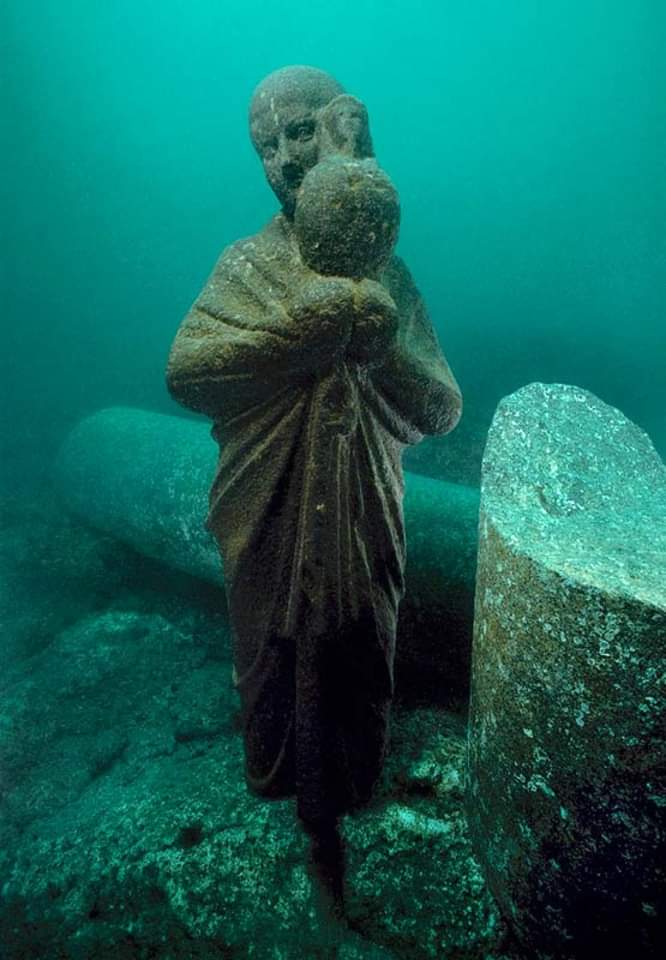 A Ptolemaic man carrying a ritual vessel