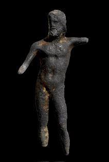 A statue of a naked man.